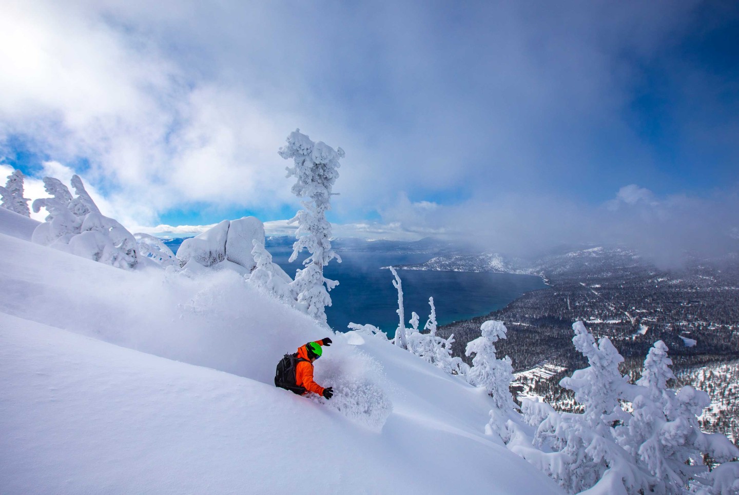 Snowboarder making a powder turn