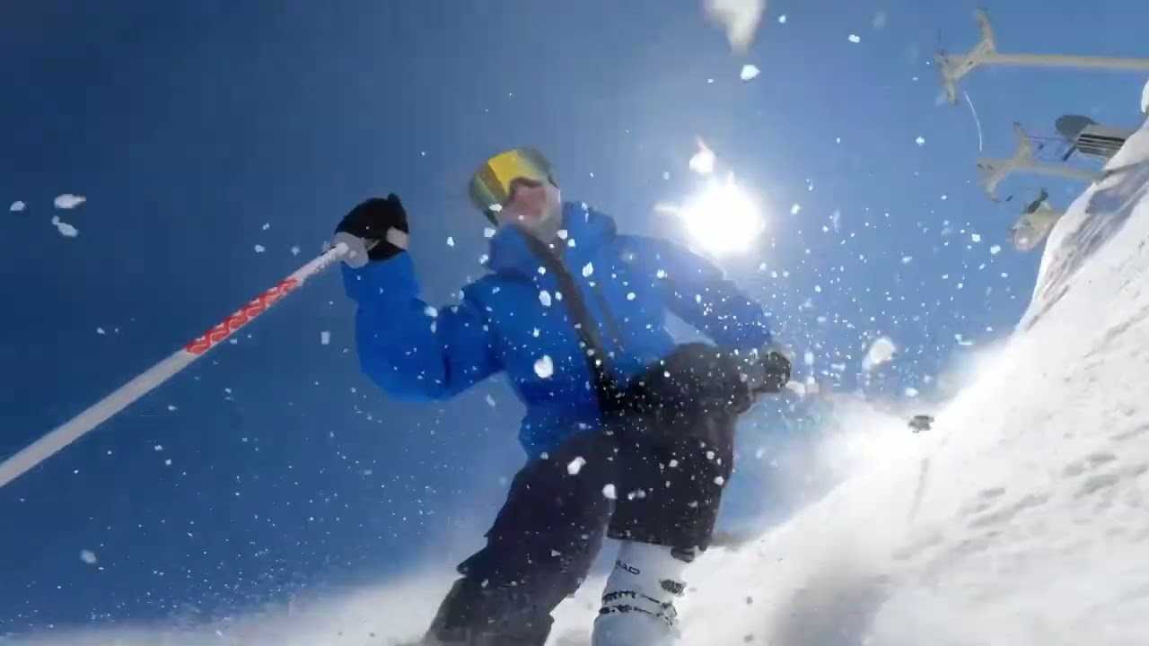 skier sending up powder